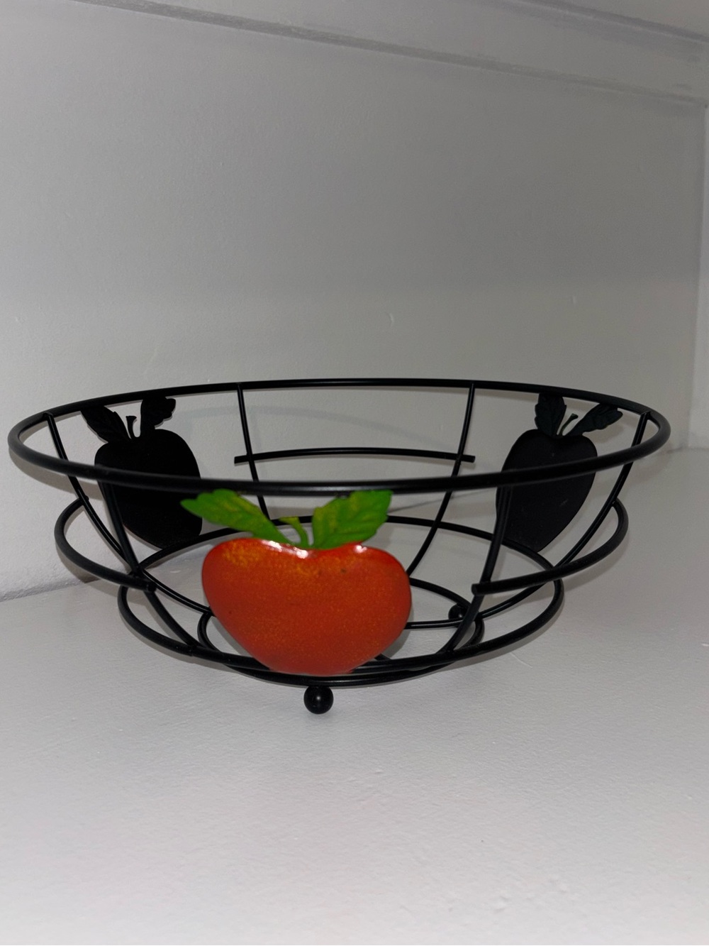 Black Metal Fruit Bowl with Red Apple Accent